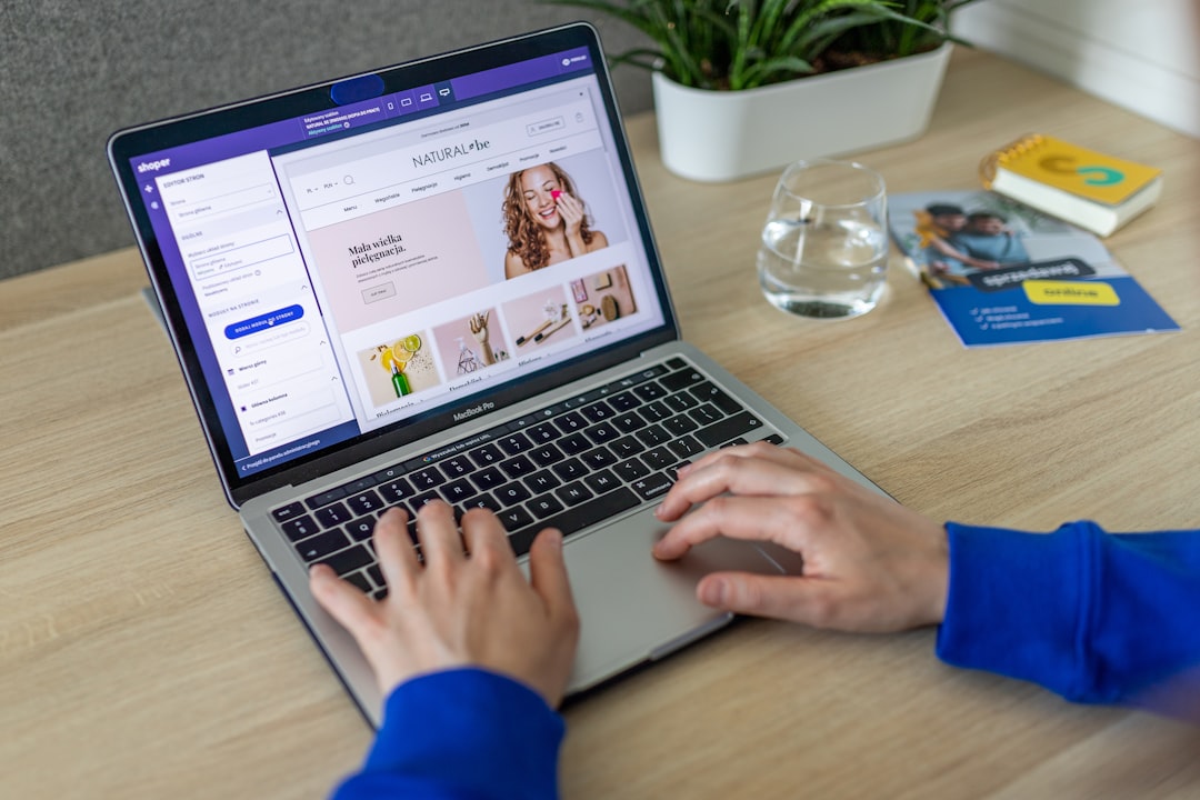 ours-journey Hands typing on keyboard, changing online store design